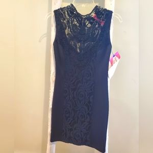 Short Black Dress. Lace Chest And Down The Middle. Size Small. NWT
